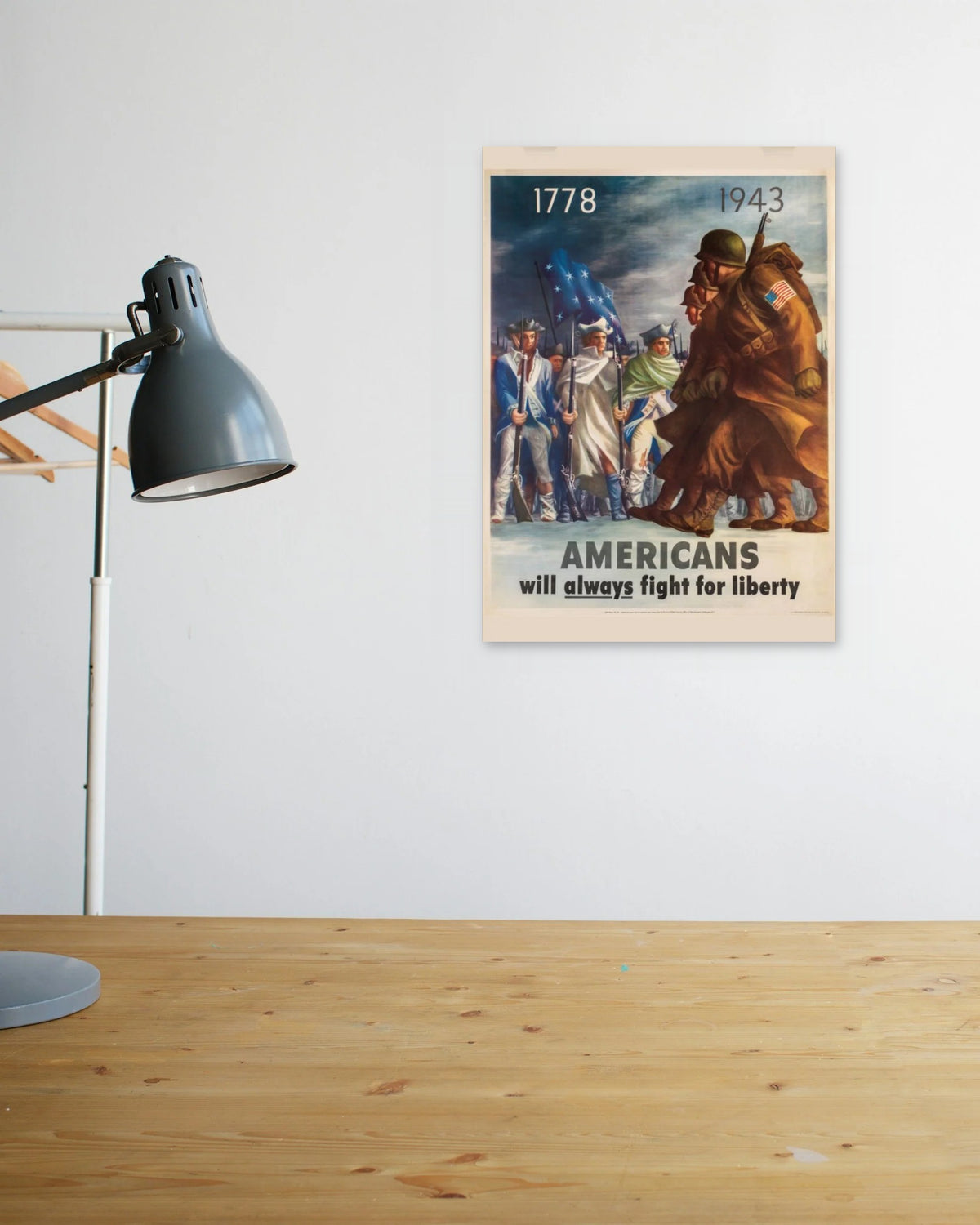 "Americans Always Fight for Liberty" poster above a wooden desk