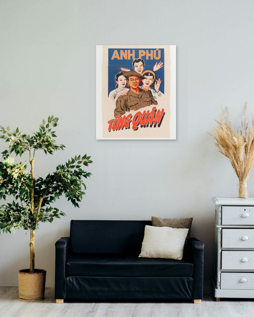 "Brother Phú Joins the Army" poster on a living room wall
