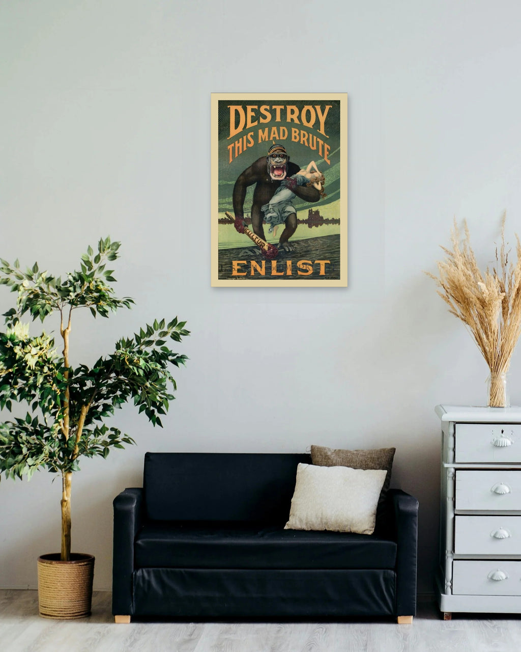 "Destroy This Mad Brute" poster on a living room wall