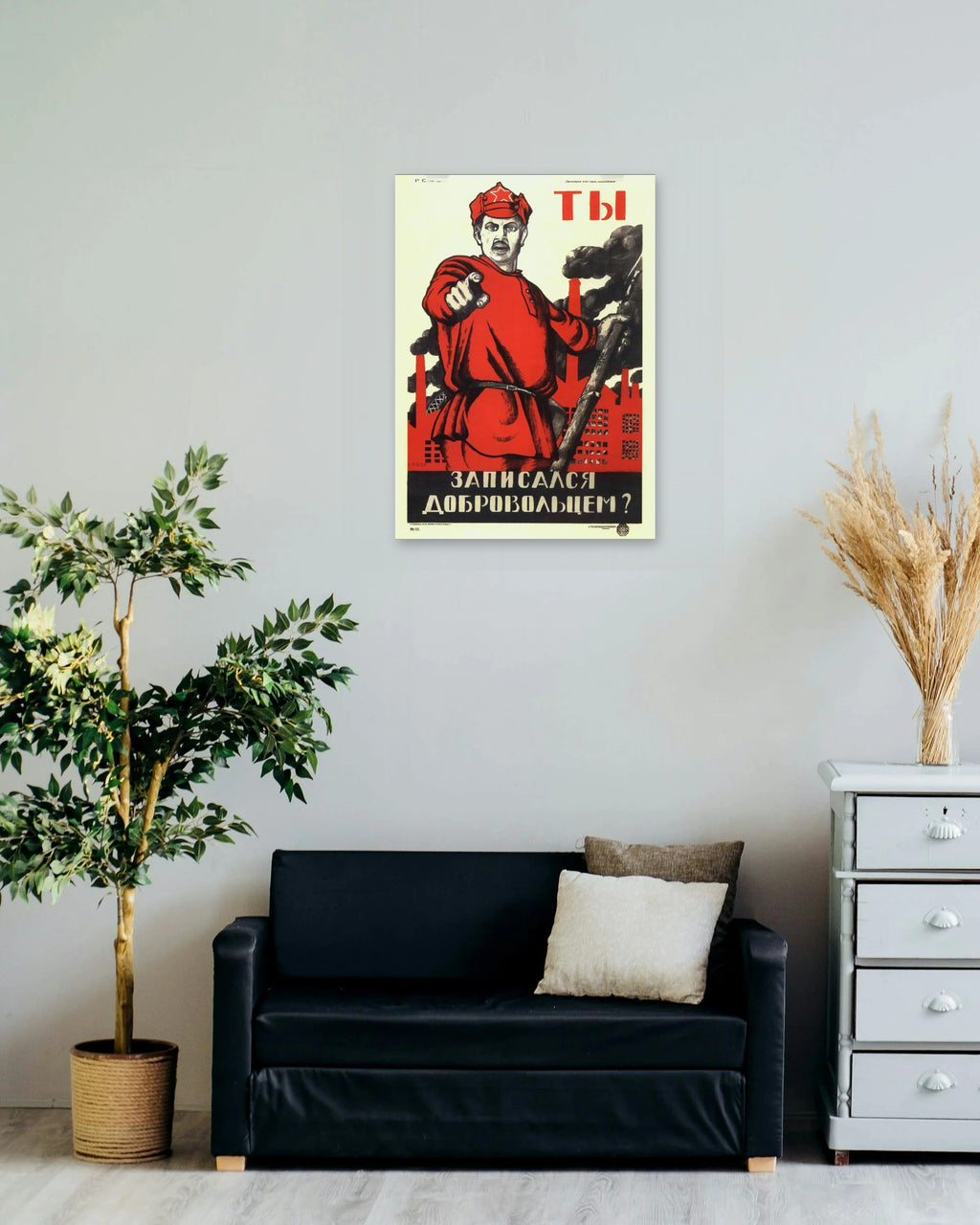 "Did You Volunteer?" poster on a living room wall