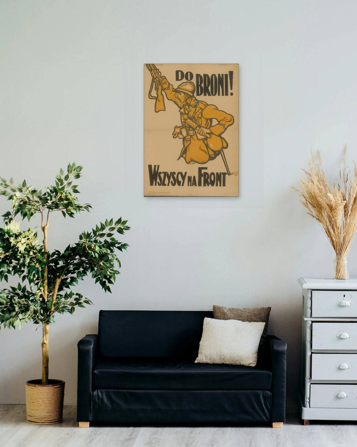 "Do Broni! Wszyscy na Front" poster on a living room wall