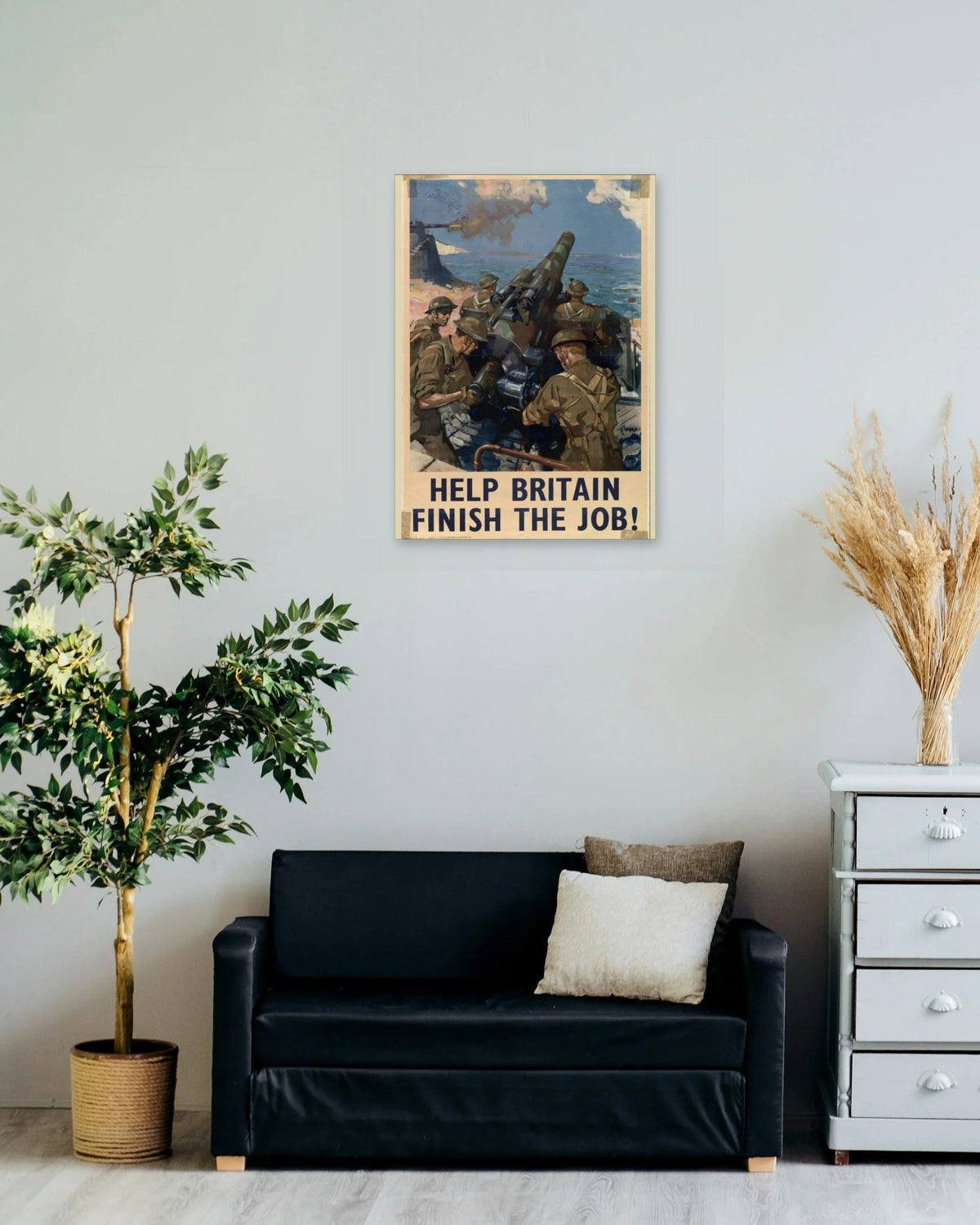 "Help Britain Finish the Job" poster on a living room wall