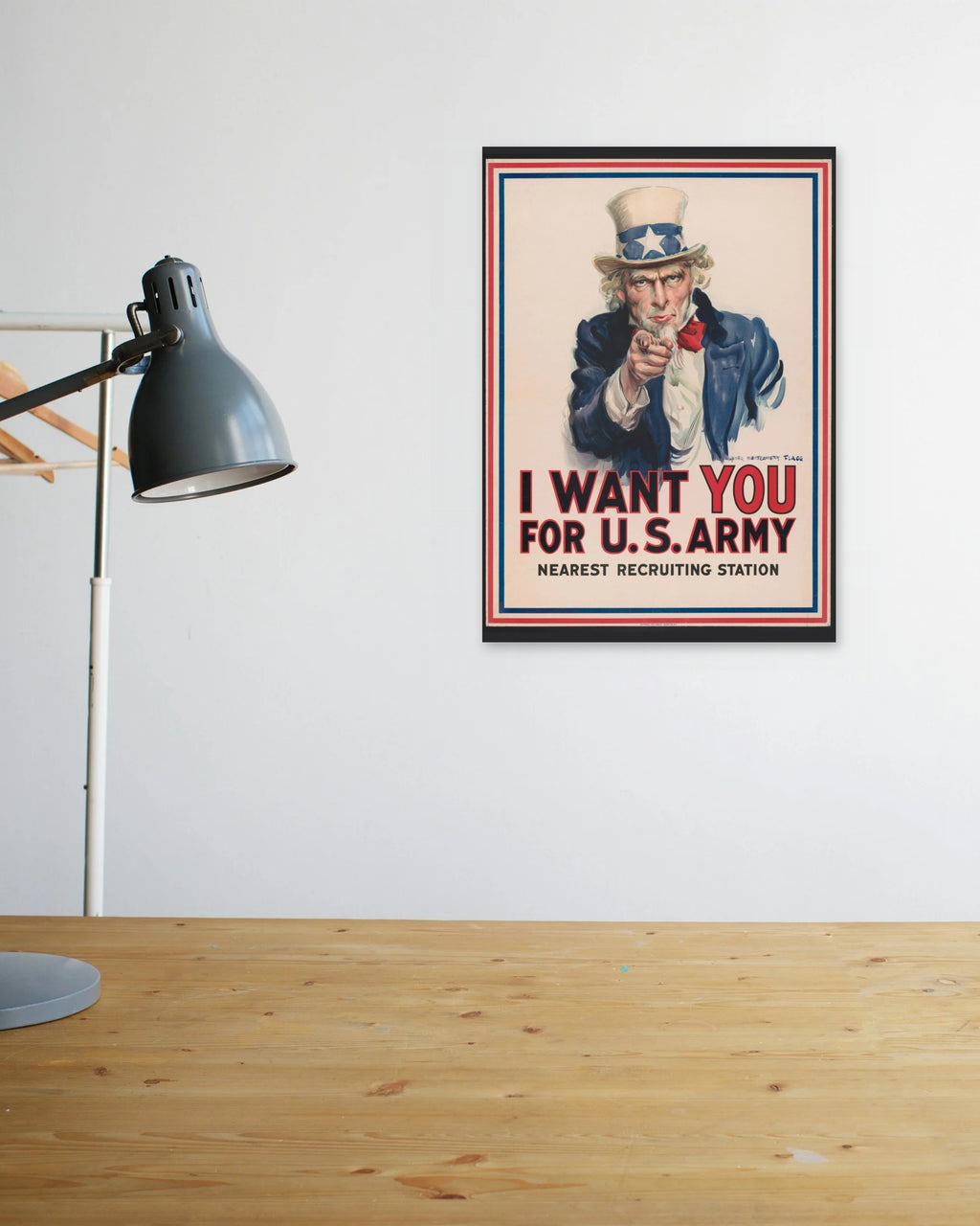 "I Want YOU for U.S. Army" poster above a wooden desk