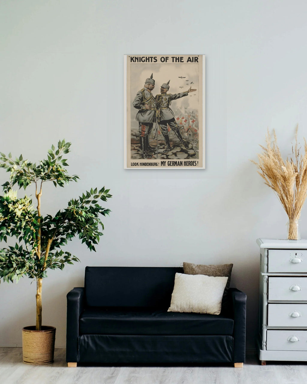 "Look Hindenburg, My German Heroes" poster on a living room wall