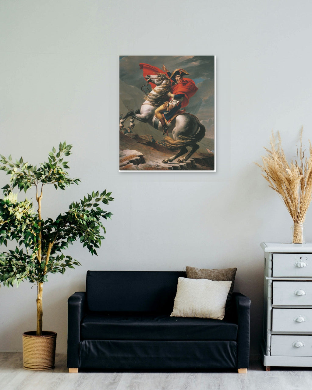 "Napoleon Crossing the Alps" poster on a living room wall