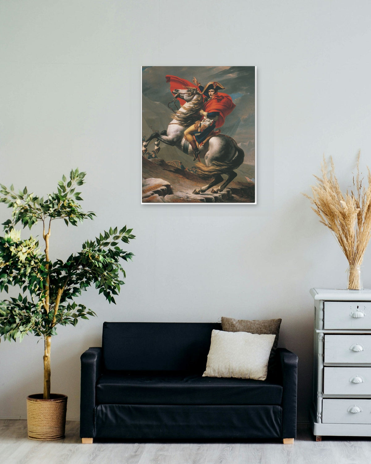 "Napoleon Crossing the Alps" poster on a living room wall