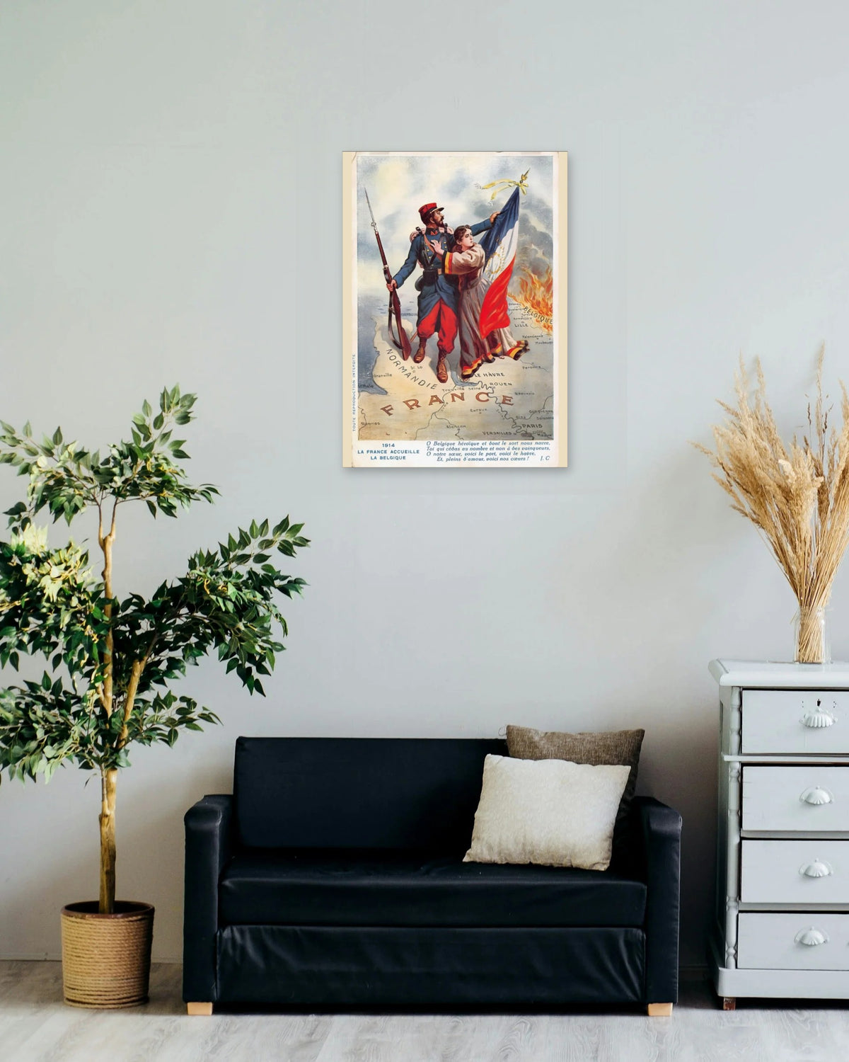"O Heroic Belgium, Whose Fate Grieves Us" poster on a living room wall