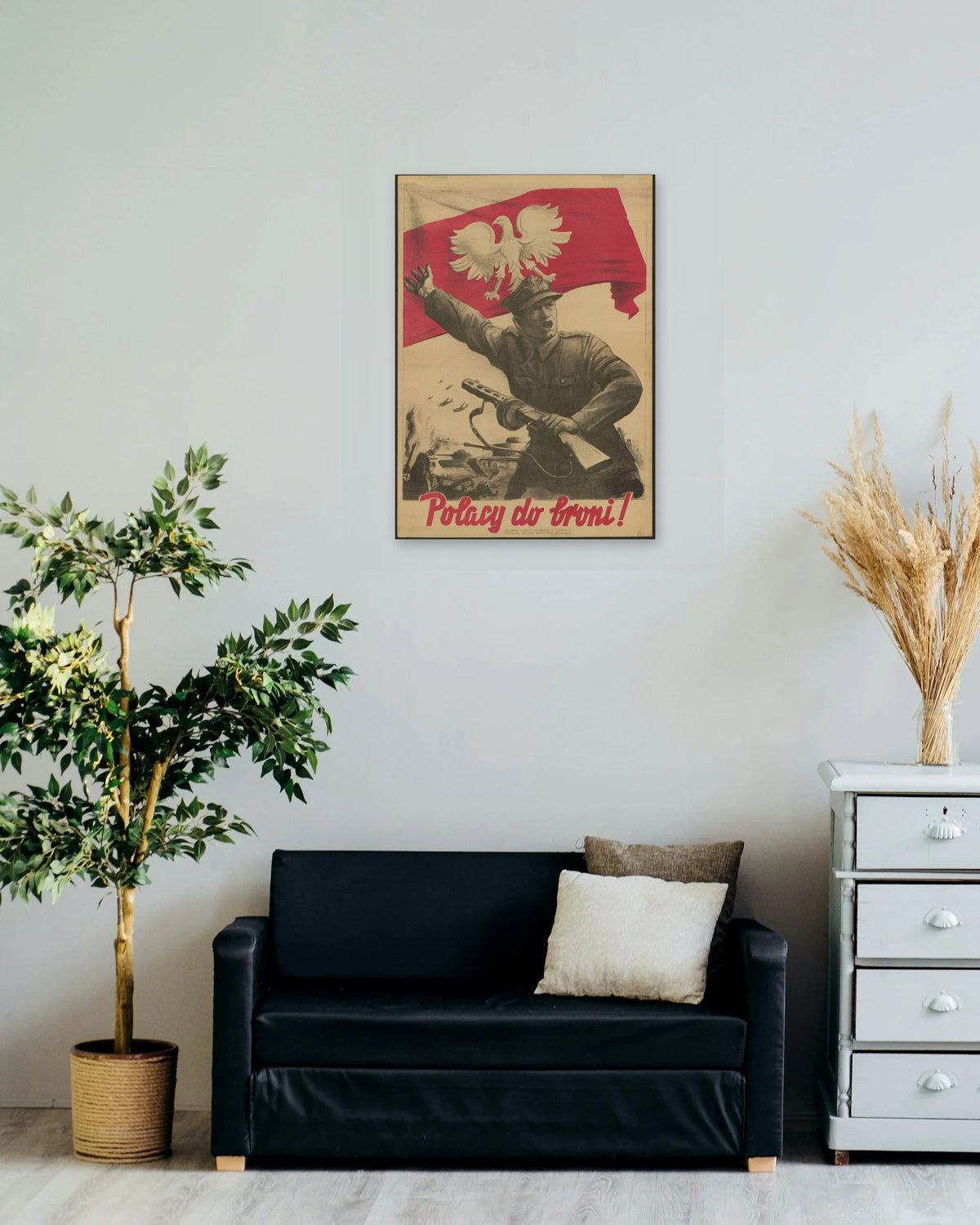 "Polacy do Broni!" poster on a living room wall