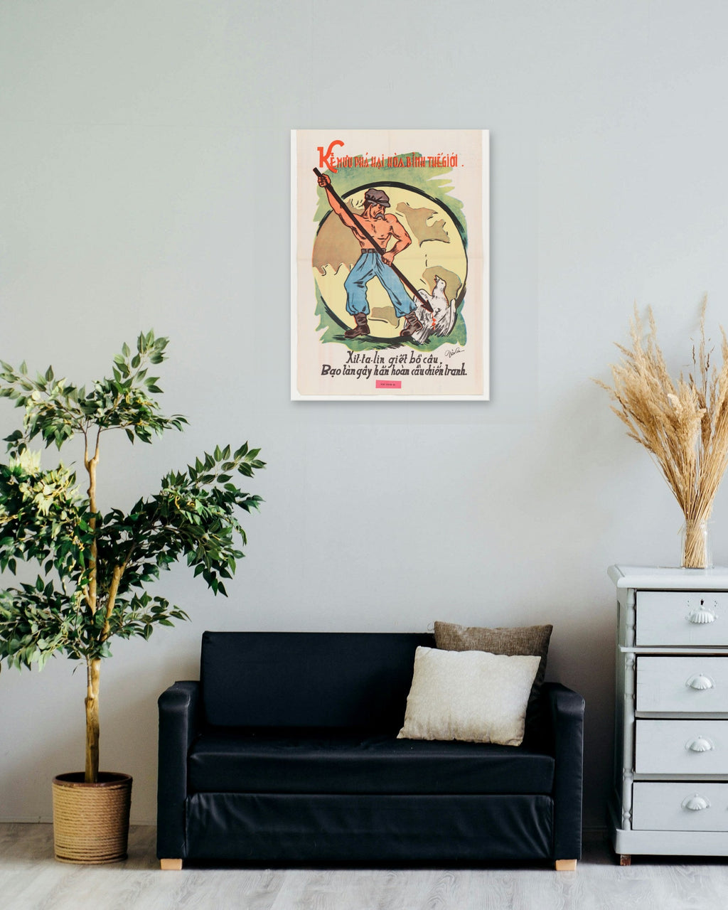 "The Destroyer of World Peace" poster on a living room wall