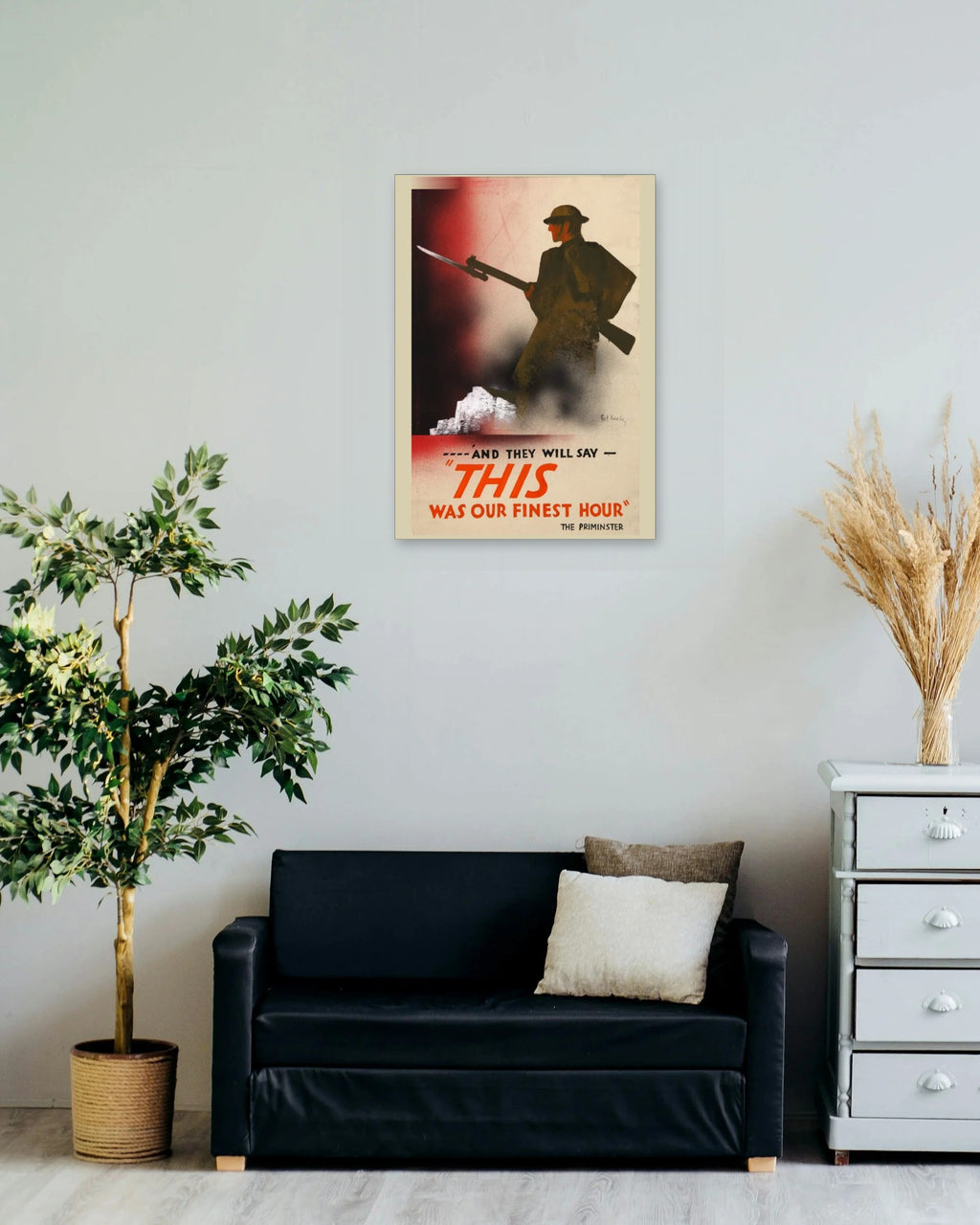 "This Was Their Finest Hour" poster on a living room wall