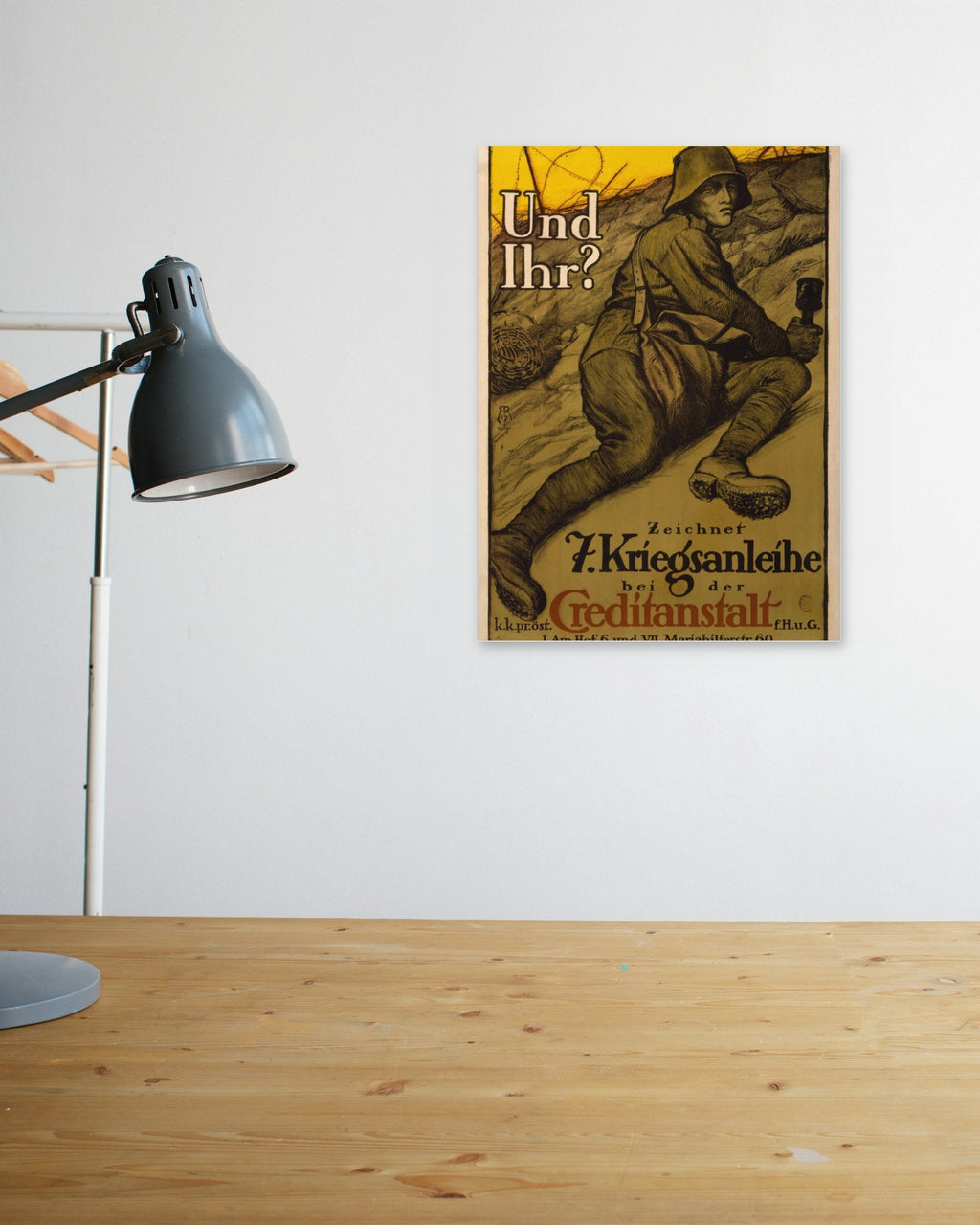 "Und Ihr?" poster above a wooden desk