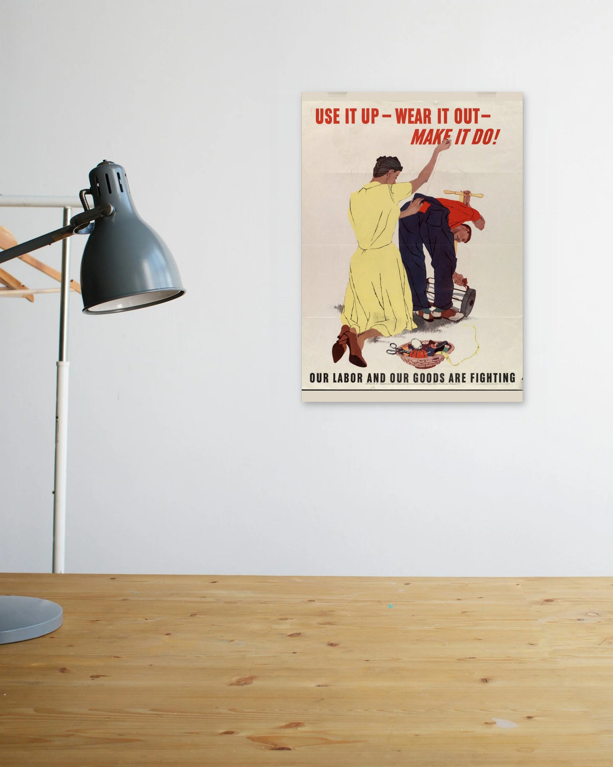 "Use It Up – Wear It Out – Make It Do!" poster above a wooden desk