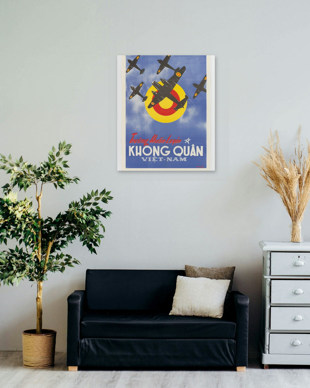 "Vietnam Air Force Training School" poster on a living room wall