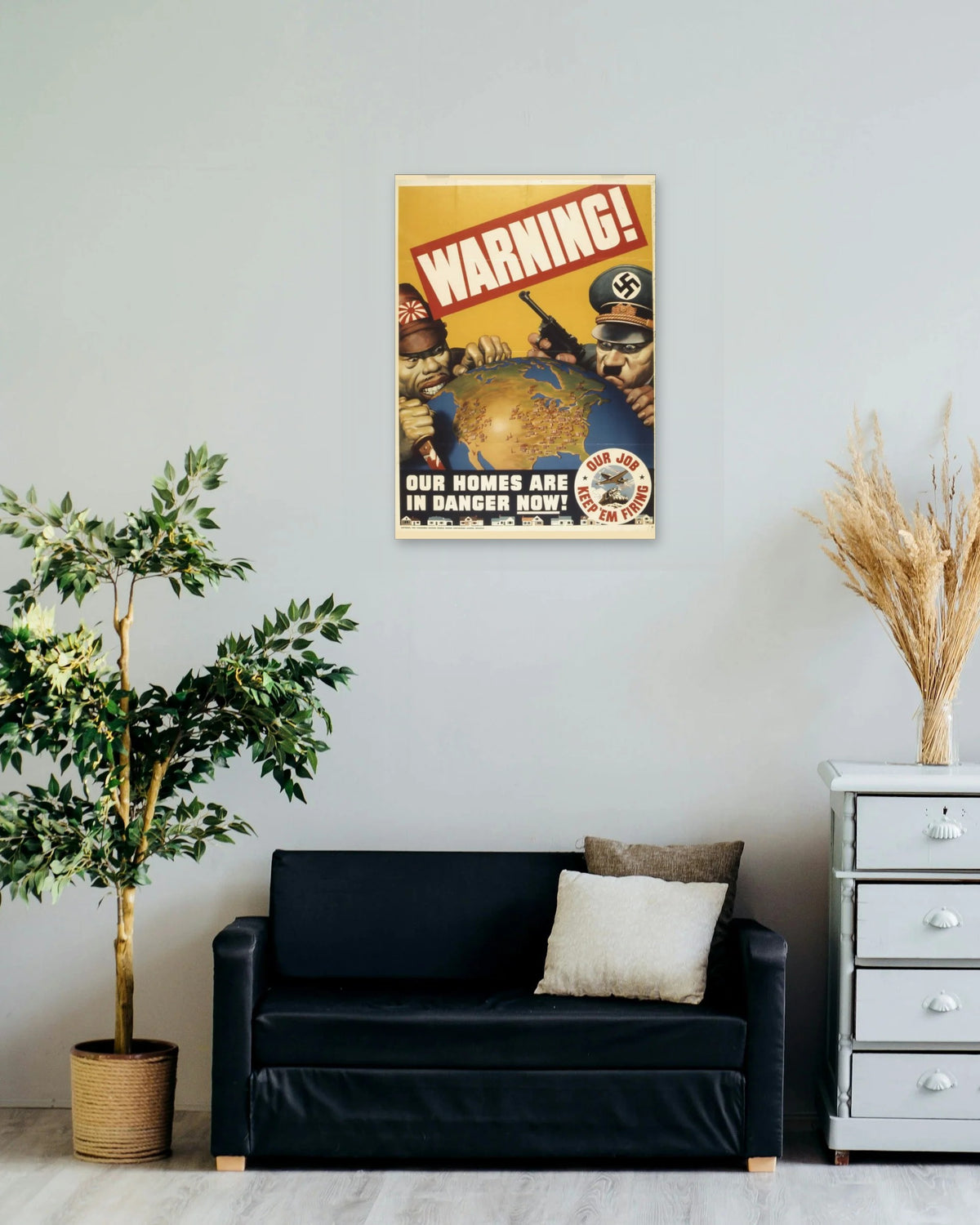 "Warning! Our Homes Are in Danger Now" poster on a living room wall