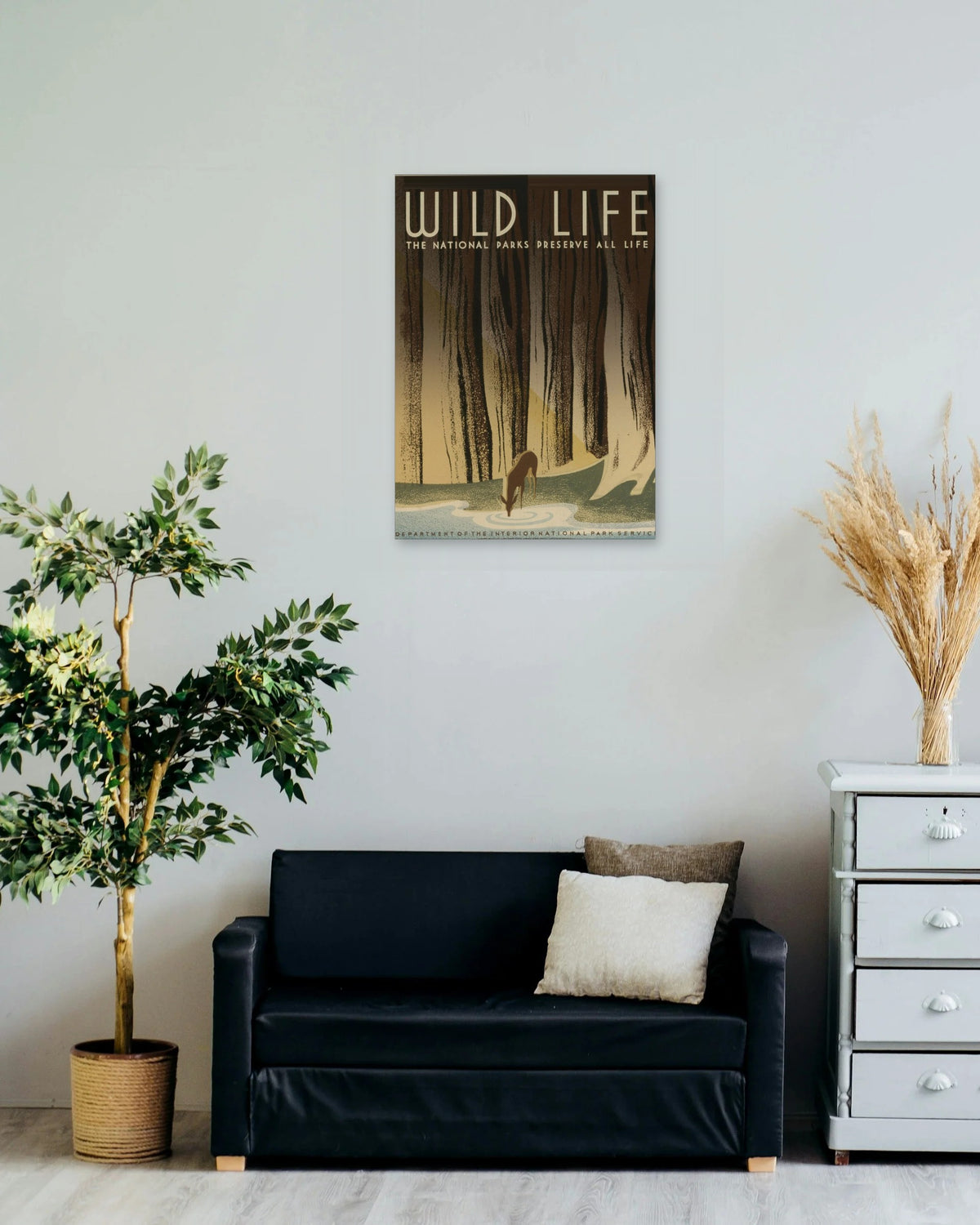 "Wild Life – The National Parks Preserve All Life" poster on a living room wall