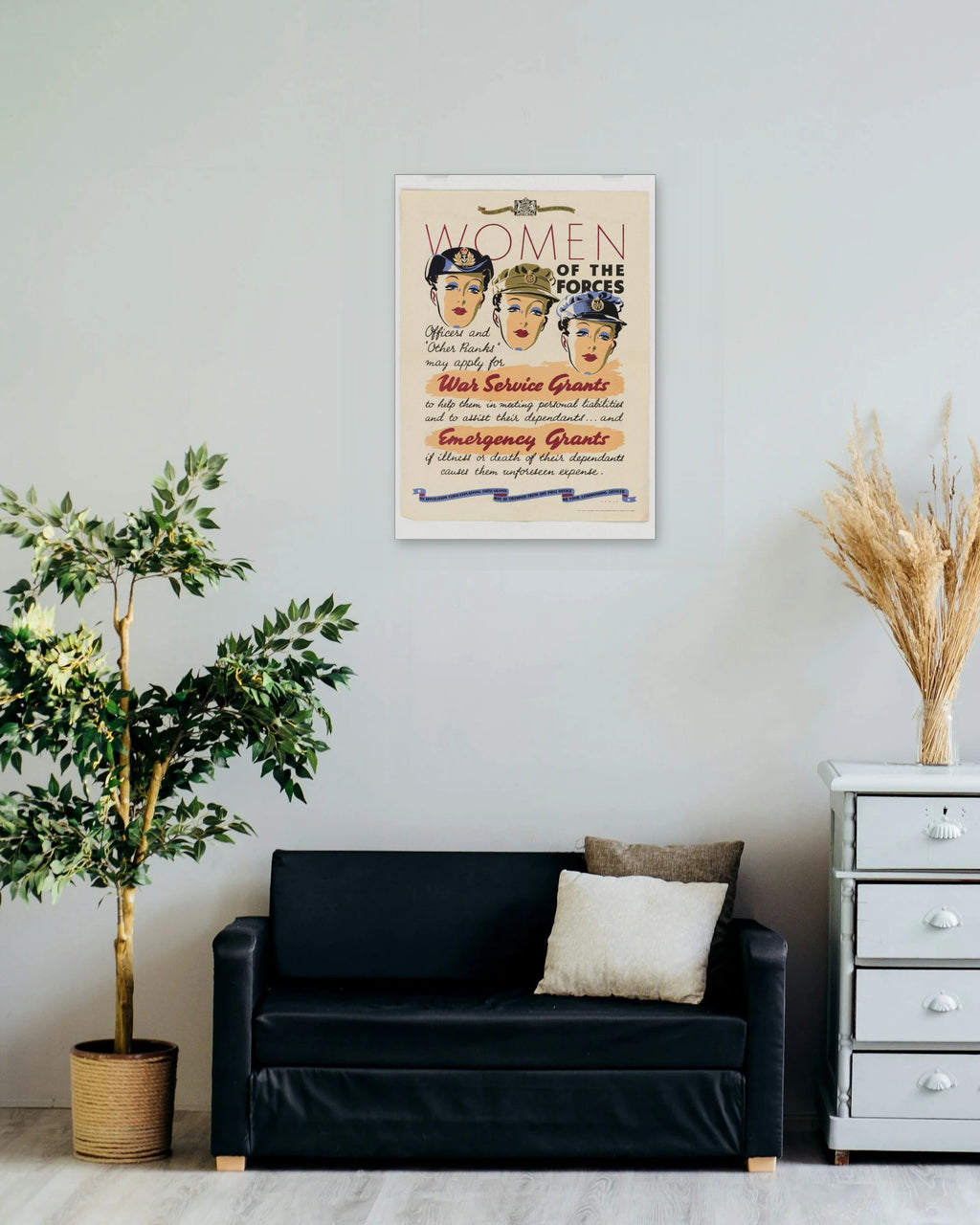 "Women of the Forces" poster on a living room wall