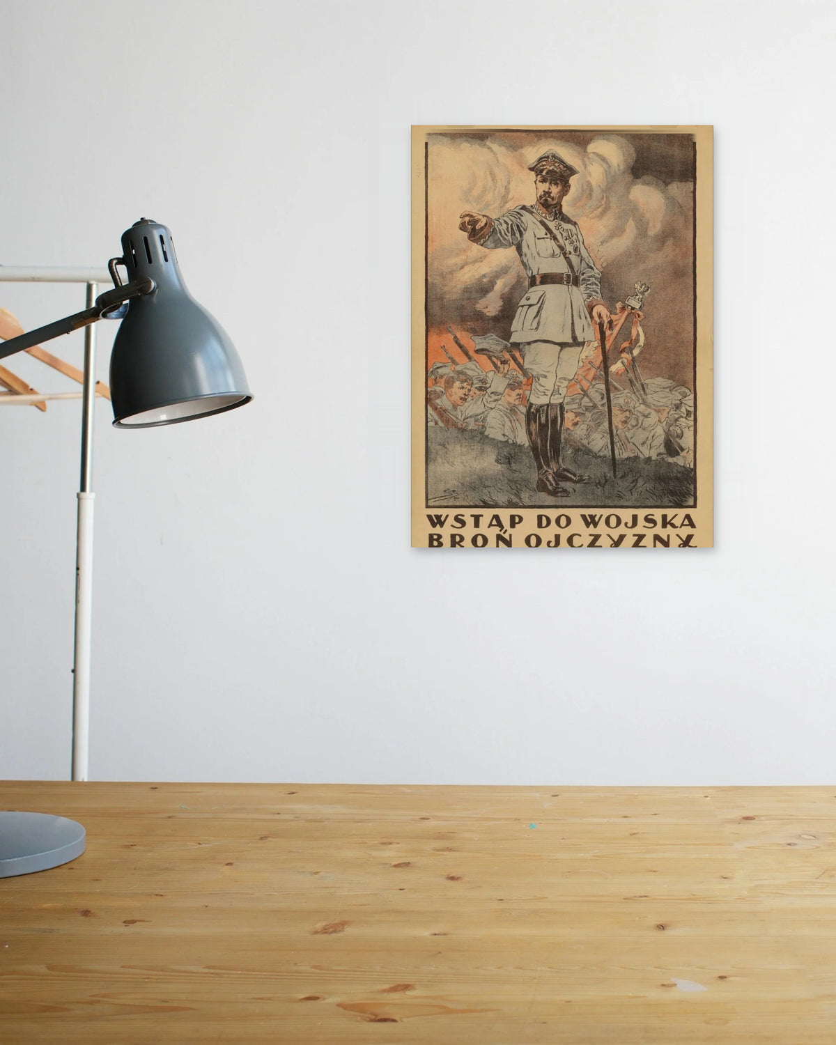 "Wstąp do Wojska" poster above a wooden desk