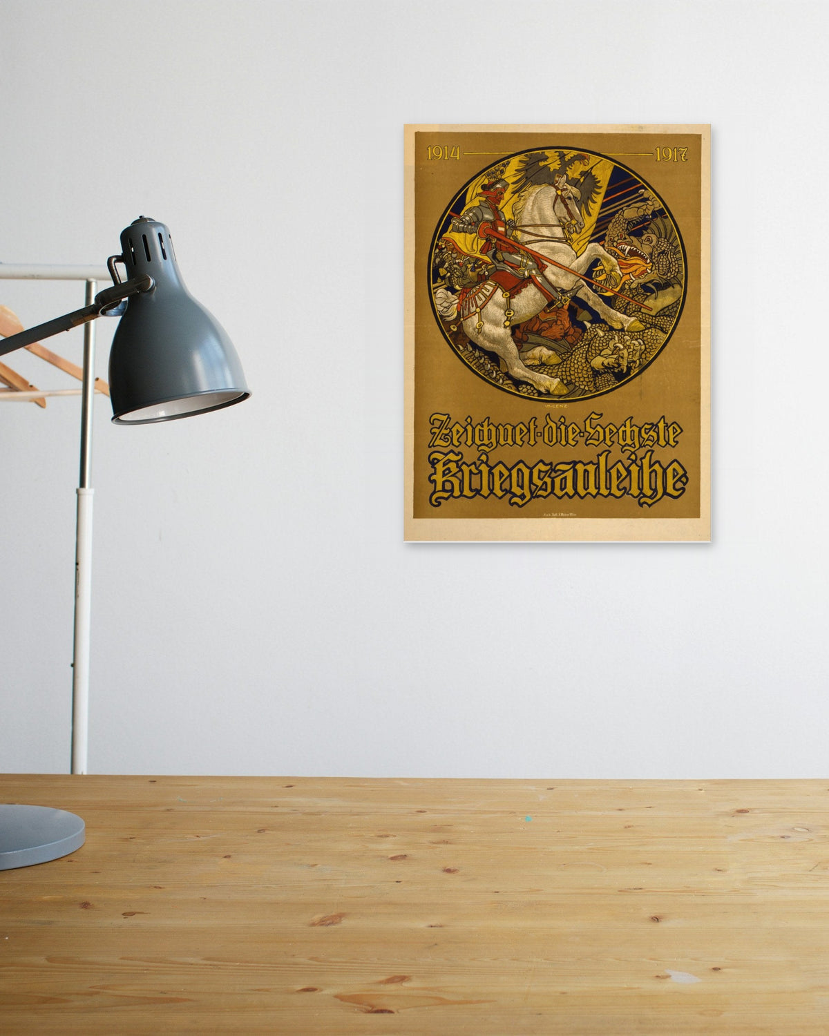 "Zeichnet die Sechste Kriegsanleihe" poster above a wooden desk